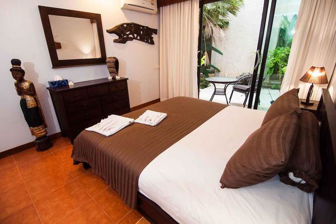 Imagen de la habitación del Hotel Penn Sunset Villa 4. Foto 2