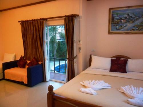 Imagen de la habitación del Hotel Pennapa Chalet. Foto 9