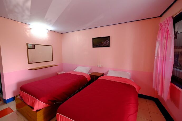 Imagen de la habitación del Hotel Penporn Guesthouse. Foto 17