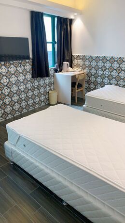 Imagen de la habitación del Hotel Pensao Elegante. Foto 9