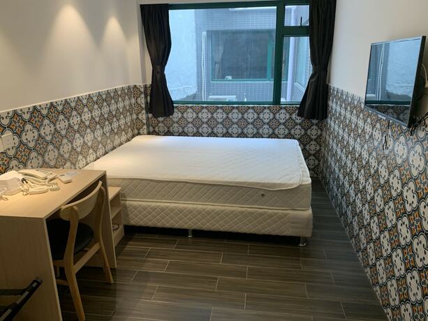 Imagen de la habitación del Hotel Pensao Elegante. Foto 11