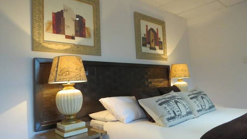 Imagen de la habitación del Hotel Pensao Guest Lodge. Foto 17