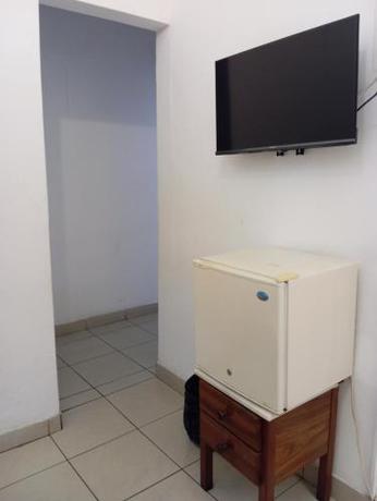 Imagen de la habitación del Hotel Pensao Martins. Foto 17