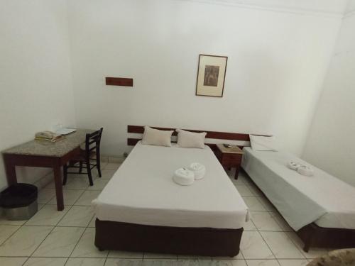 Imagen de la habitación del Hotel Pensao Martins. Foto 18