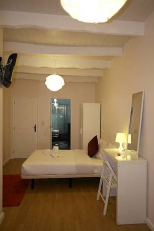 Imagen de la habitación del Hotel Pensão Central. Foto 9