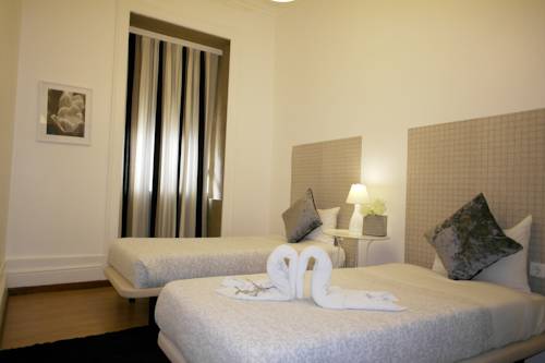 Imagen de la habitación del Hotel Pensão Central. Foto 11