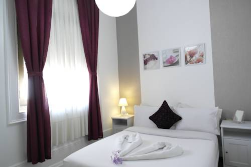 Imagen de la habitación del Hotel Pensão Central. Foto 16