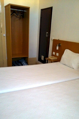 Imagen de la habitación del Hotel Pensão Residencial Internacional. Foto 8