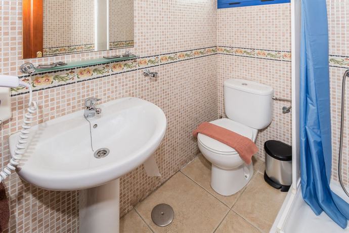 Imagen de la habitación del Hotel Pensión MAGEC. Foto 13