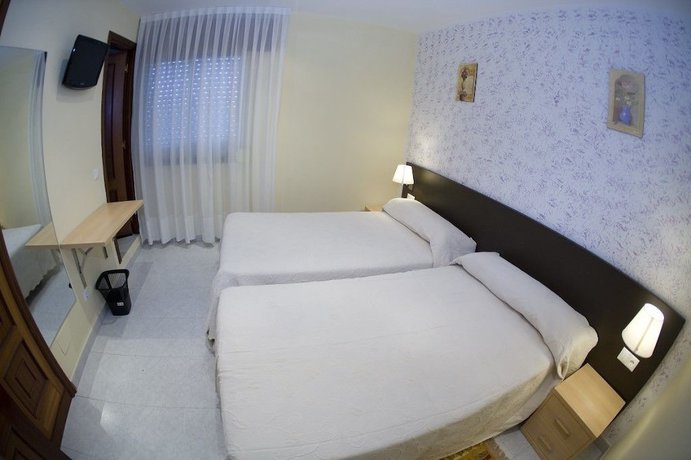 Imagen de la habitación del Hotel Pensi&oacute;n O Cruceiro da Ulla. Foto 11