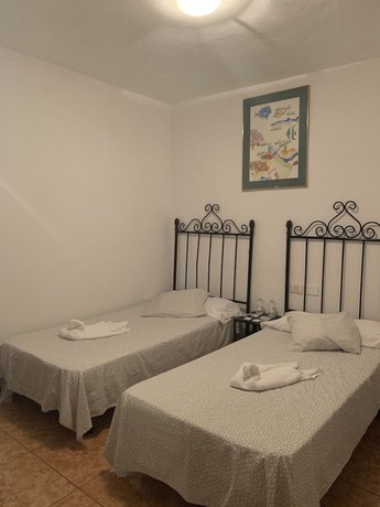 Imagen de la habitación del Hotel Pension Casa Blanca. Foto 9