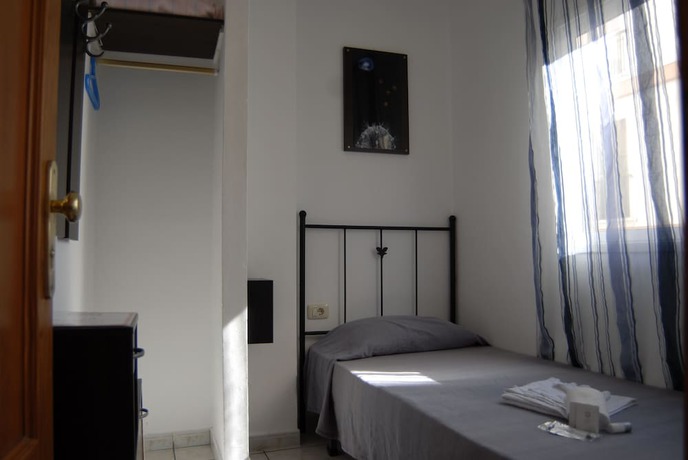 Imagen de la habitación del Hotel Pension Casa Blanca. Foto 14