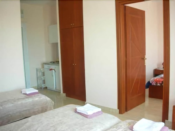 Imagen de la habitación del Hotel Pension Delfini. Foto 14