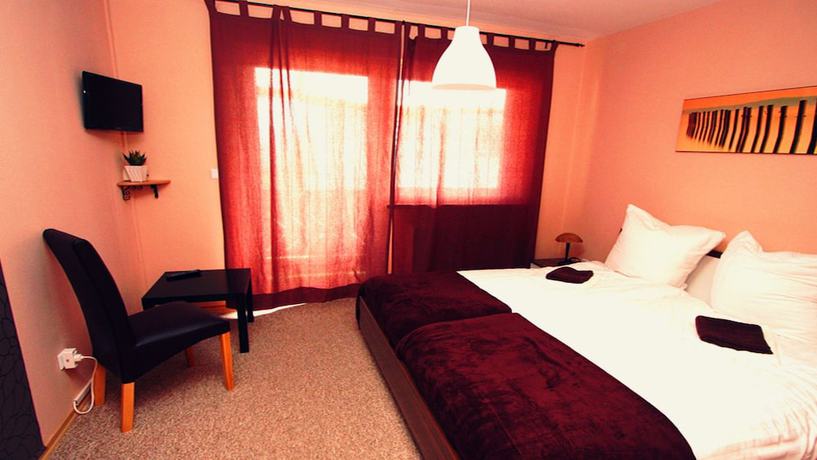 Imagen de la habitación del Hotel Pension Elan. Foto 10