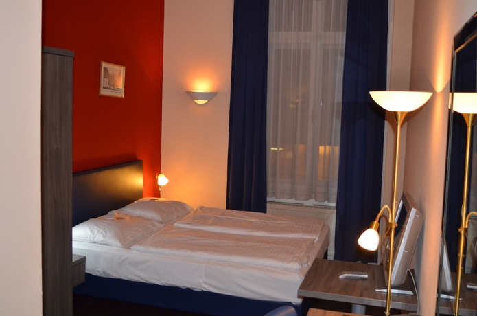 Imagen de la habitación del Hotel Pension Excellence. Foto 3