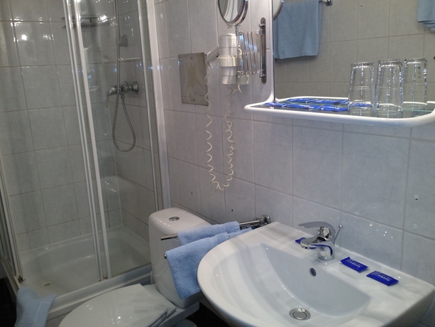 Imagen de la habitación del Hotel Pension Excellence. Foto 6