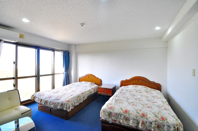 Imagen de la habitación del Hotel Pension Hana Miyakojima. Foto 7