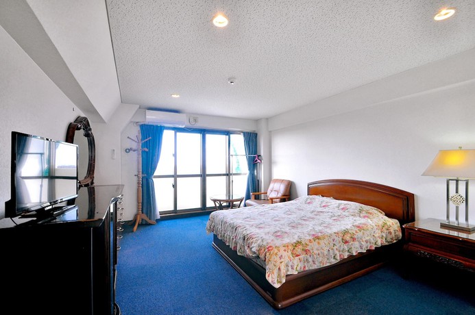 Imagen de la habitación del Hotel Pension Hana Miyakojima. Foto 9