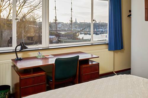 Imagen de la habitación del Hotel Pension Homeland. Foto 3