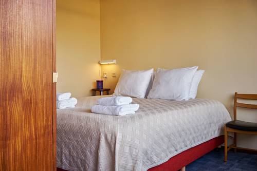 Imagen de la habitación del Hotel Pension Homeland. Foto 6