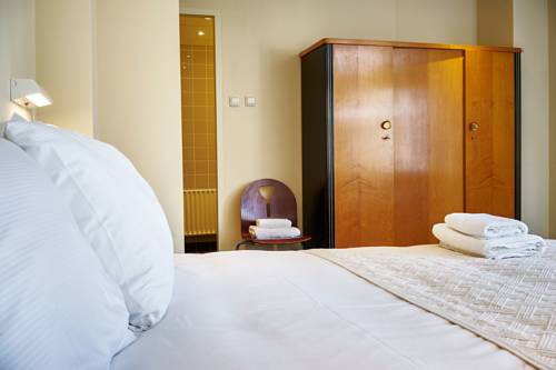 Imagen de la habitación del Hotel Pension Homeland. Foto 8