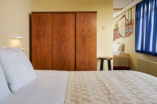 Imagen de la habitación del Hotel Pension Homeland. Foto 9