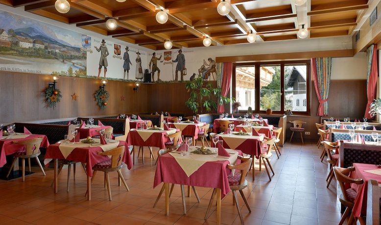 Imagen del bar/restaurante del Hotel Pension H&uuml;ttwirt. Foto 6