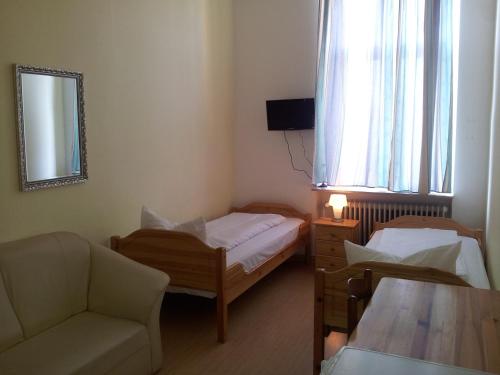 Imagen de la habitación del Hotel Pension Im Bett. Foto 10