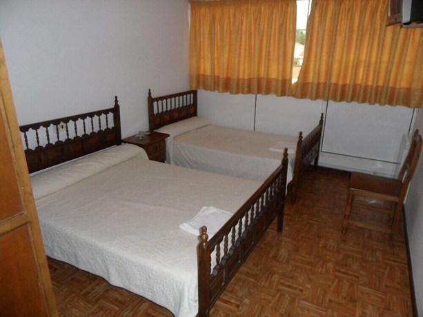 Imagen de la habitación del Hotel Pension Los Trillizos-O Lar do Trilli. Foto 7