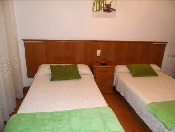 Imagen de la habitación del Hotel Pension Los Trillizos-O Lar do Trilli. Foto 12