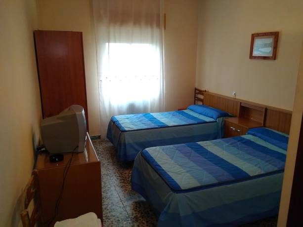 Imagen de la habitación del Hotel Pension Martinez. Foto 10