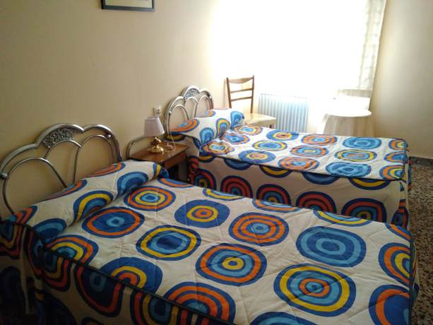 Imagen de la habitación del Hotel Pension Martinez. Foto 11