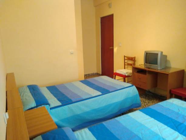 Imagen de la habitación del Hotel Pension Martinez. Foto 15