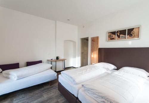 Imagen de la habitación del Hotel Pension Max SUMMERCARD INCLUDED. Foto 10