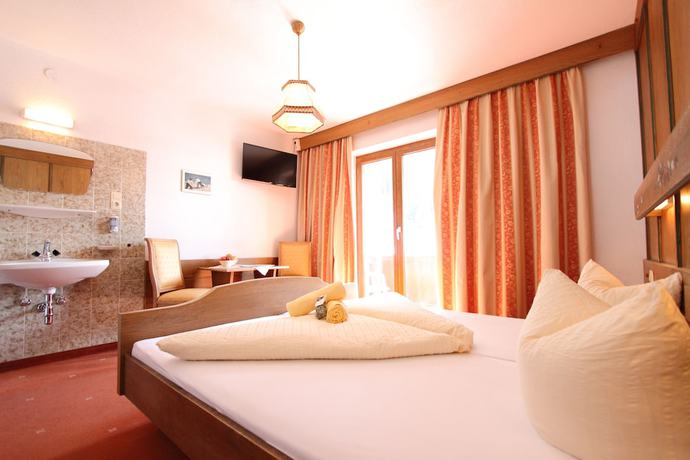 Imagen de la habitación del Hotel Pension Mittagskogel. Foto 6