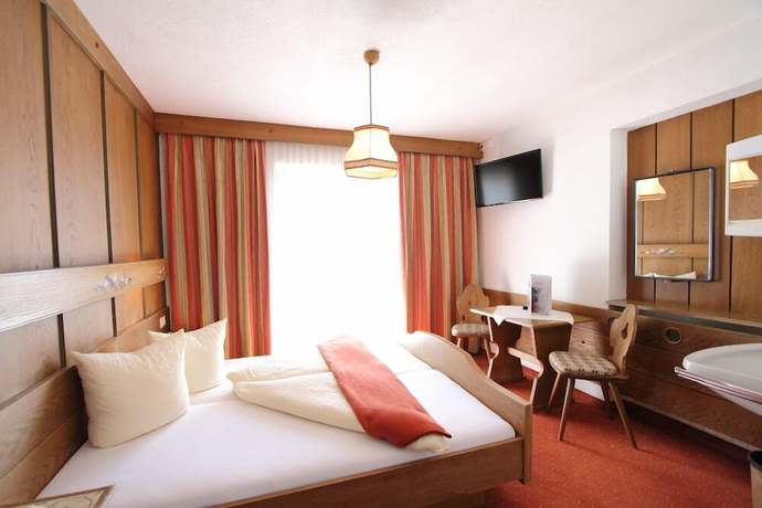 Imagen de la habitación del Hotel Pension Mittagskogel. Foto 13