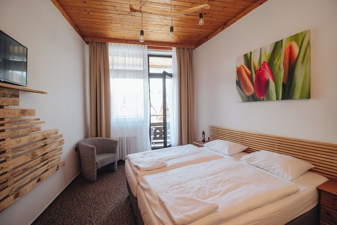 Imagen de la habitación del Hotel Pension Mona. Foto 4