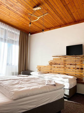 Imagen de la habitación del Hotel Pension Mona. Foto 12