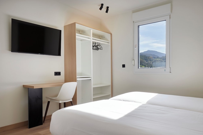Imagen de la habitación del Hotel Pension Pakeleku. Foto 12