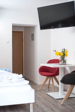 Imagen de la habitación del Hotel Pension Pernthaler. Foto 13