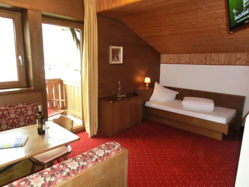 Imagen de la habitación del Hotel Pension Sattlerenglhof. Foto 9