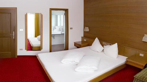 Imagen de la habitación del Hotel Pension Sattlerenglhof. Foto 10