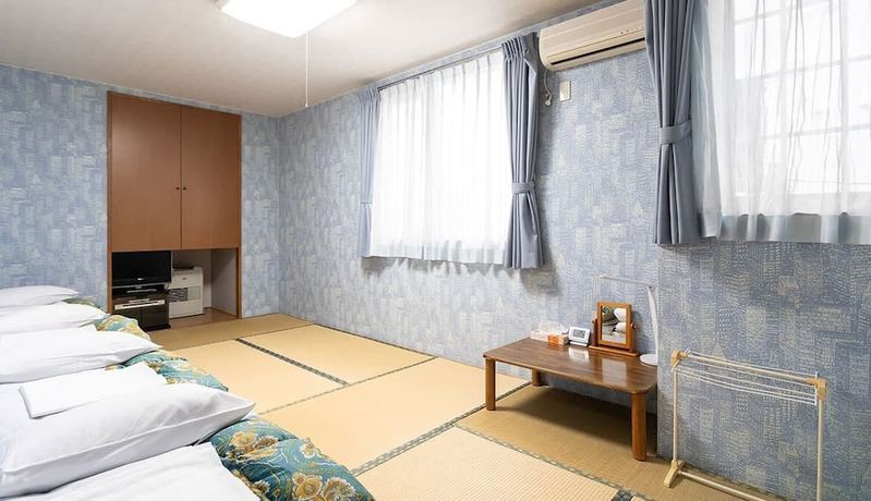 Imagen de la habitación del Hotel Pension Setsurin. Foto 11
