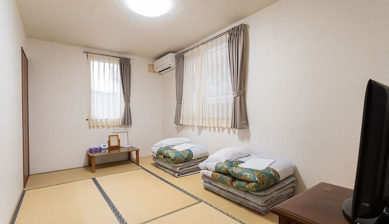 Imagen de la habitación del Hotel Pension Setsurin. Foto 12