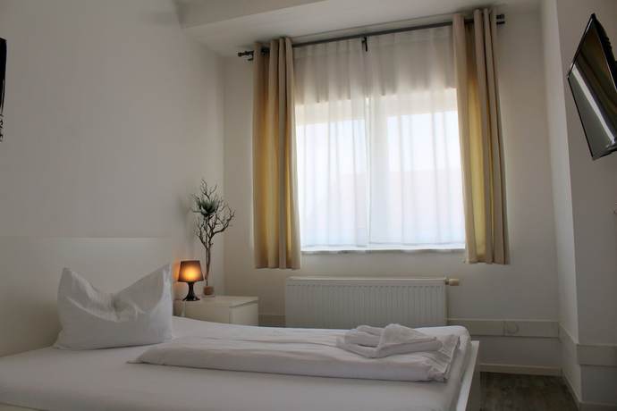 Imagen de la habitación del Hotel Pension Wess. Foto 18