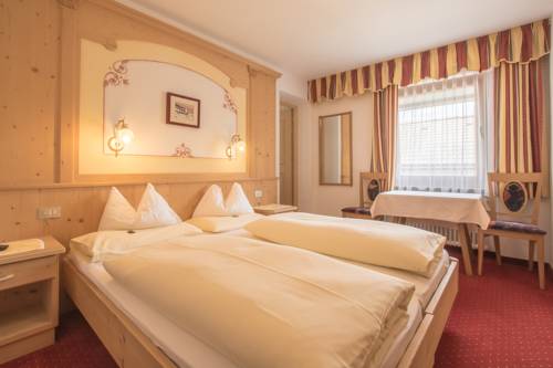 Imagen de la habitación del Hotel Pensione Camoscio. Foto 3