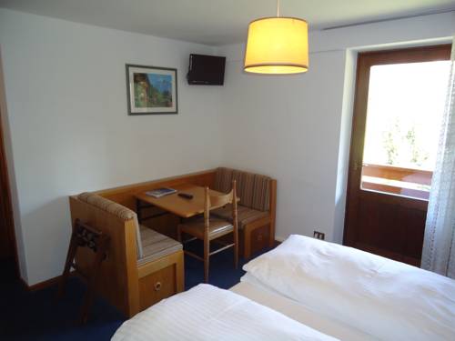 Imagen de la habitación del Hotel Pensione Dolomiti. Foto 7