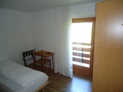 Imagen de la habitación del Hotel Pensione Dolomiti. Foto 11