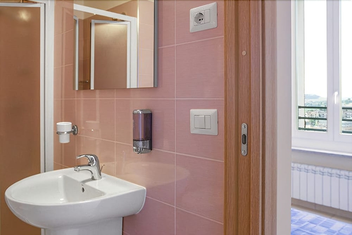 Imagen de la habitación del Hotel Pensione Piemonte. Foto 7