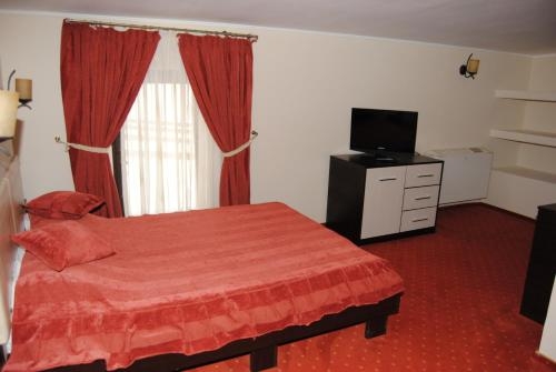 Imagen de la habitación del Hotel Pensiune Heavens. Foto 6